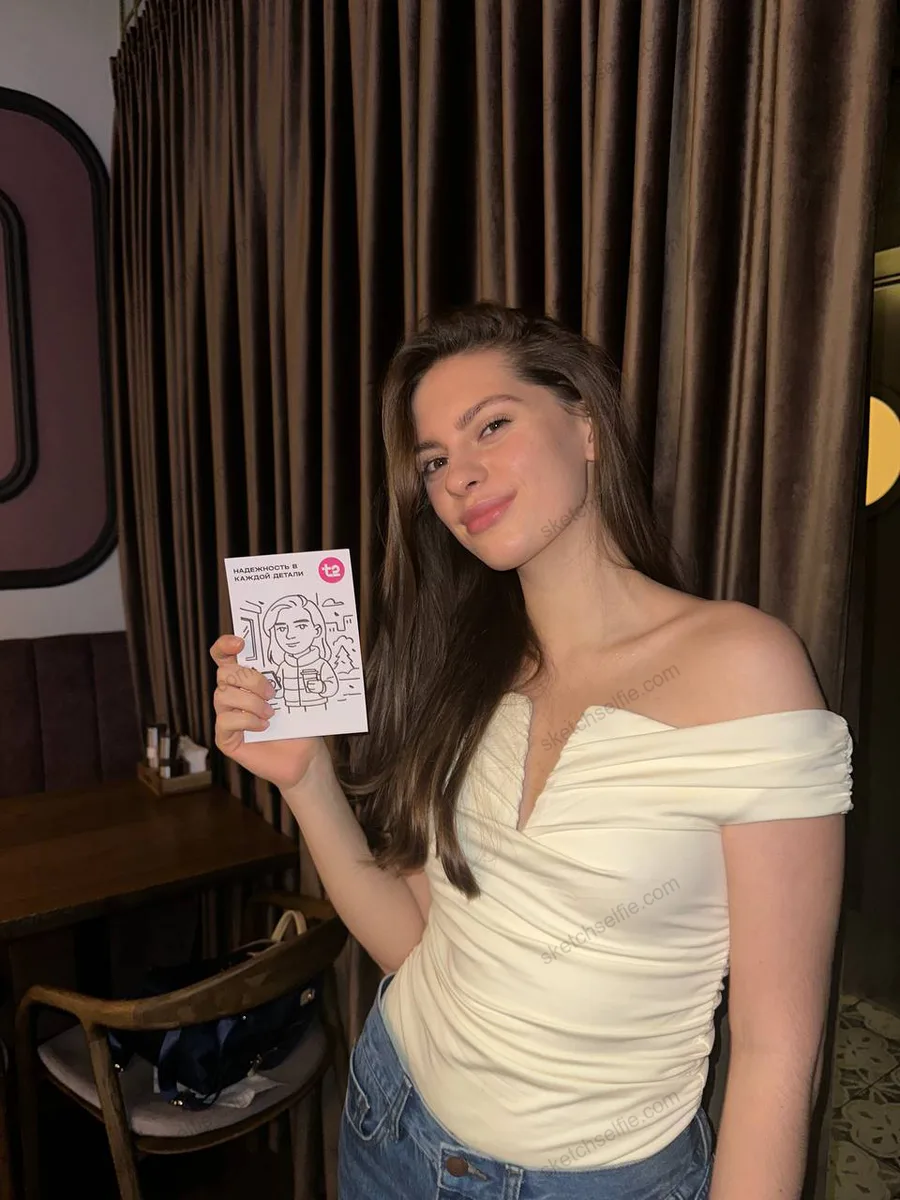 girl with a sketchbot portrait in hand