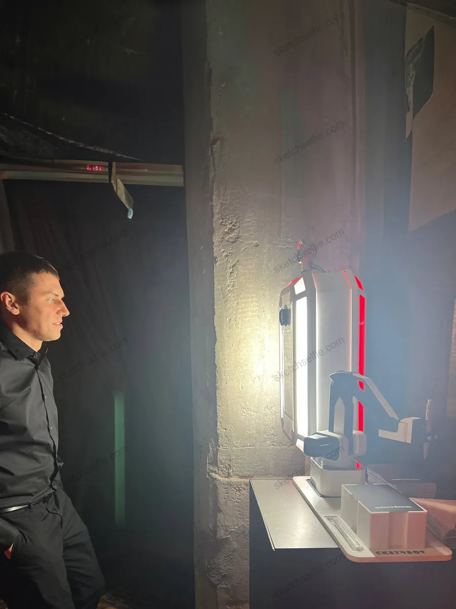 guy posing for a sketchbot portrait