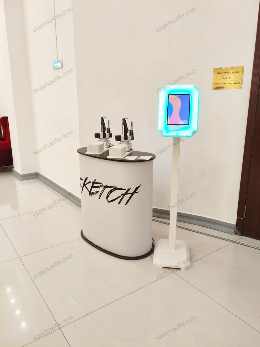 two sketch robots at product presentation