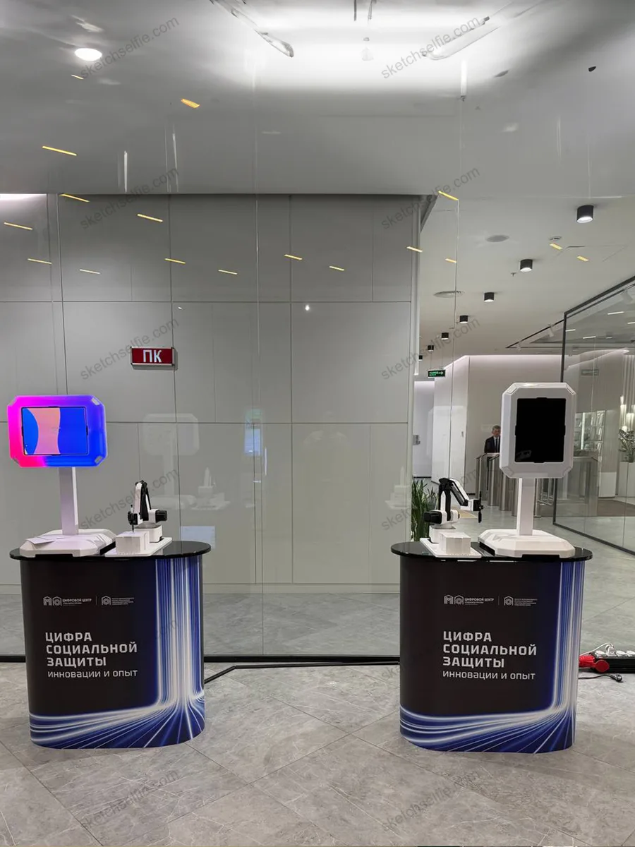 two sketchbot robots at promo event